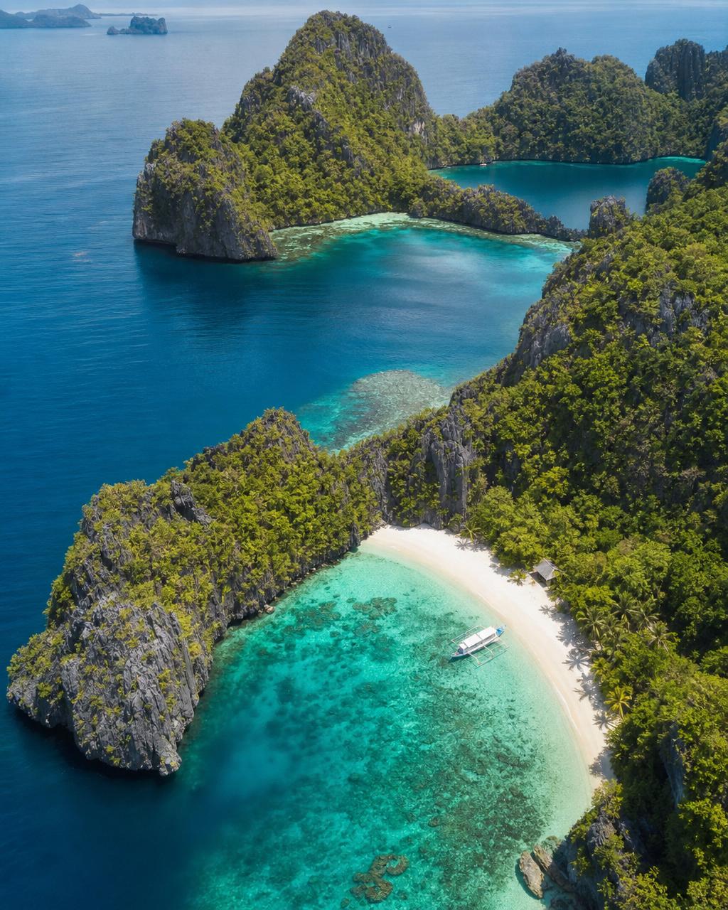 Aerial view of a remote tropical island lagoon